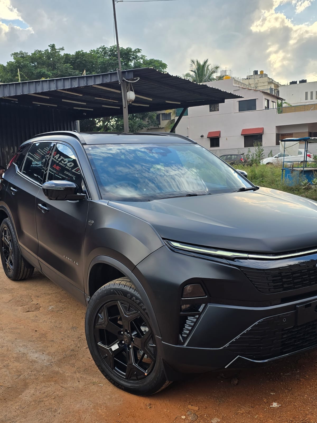 Matte black SUV detailed outside Octa 4